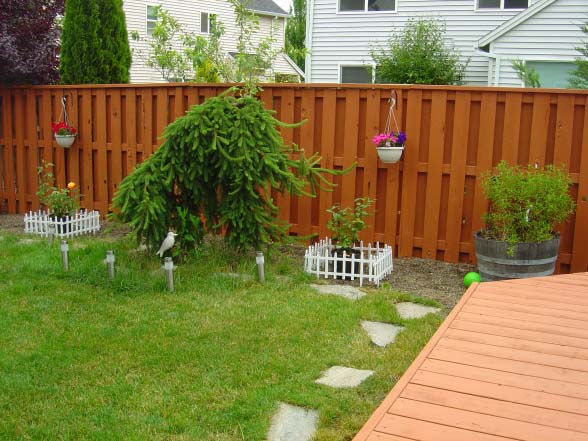 Exterior tips for residential painting backyard fence painting classic ideas from Summit Coatings