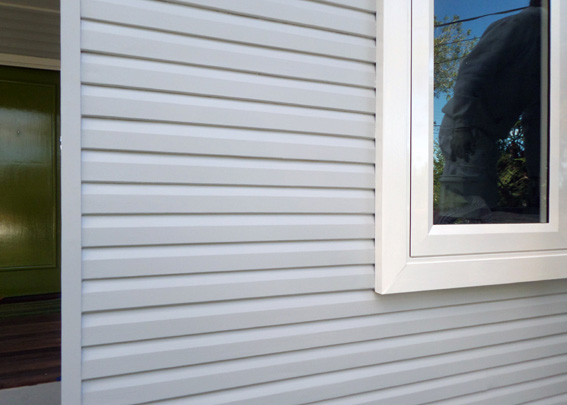 Reaired weatherboards and tips from residential painters in North Shore Summit Coatings